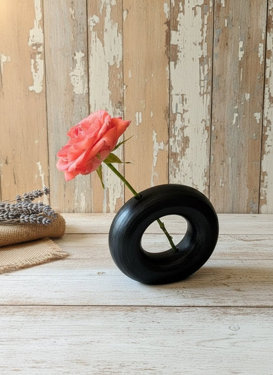 Ceramic object #54 (Black donut vase with hole)