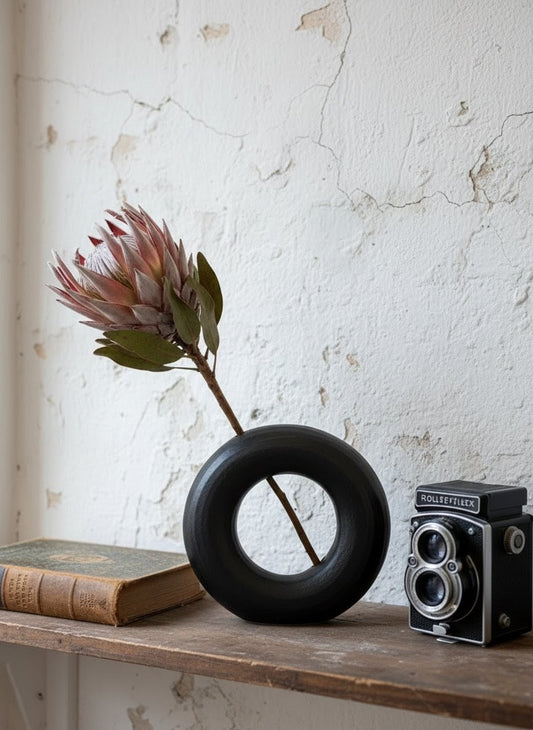 Ceramic object #54 (Black donut vase with hole)